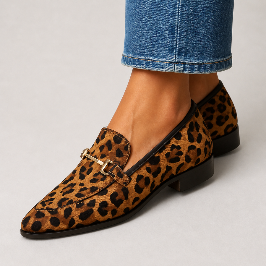 Women's slip-on loafers with a bold wild animal print and refined finishing