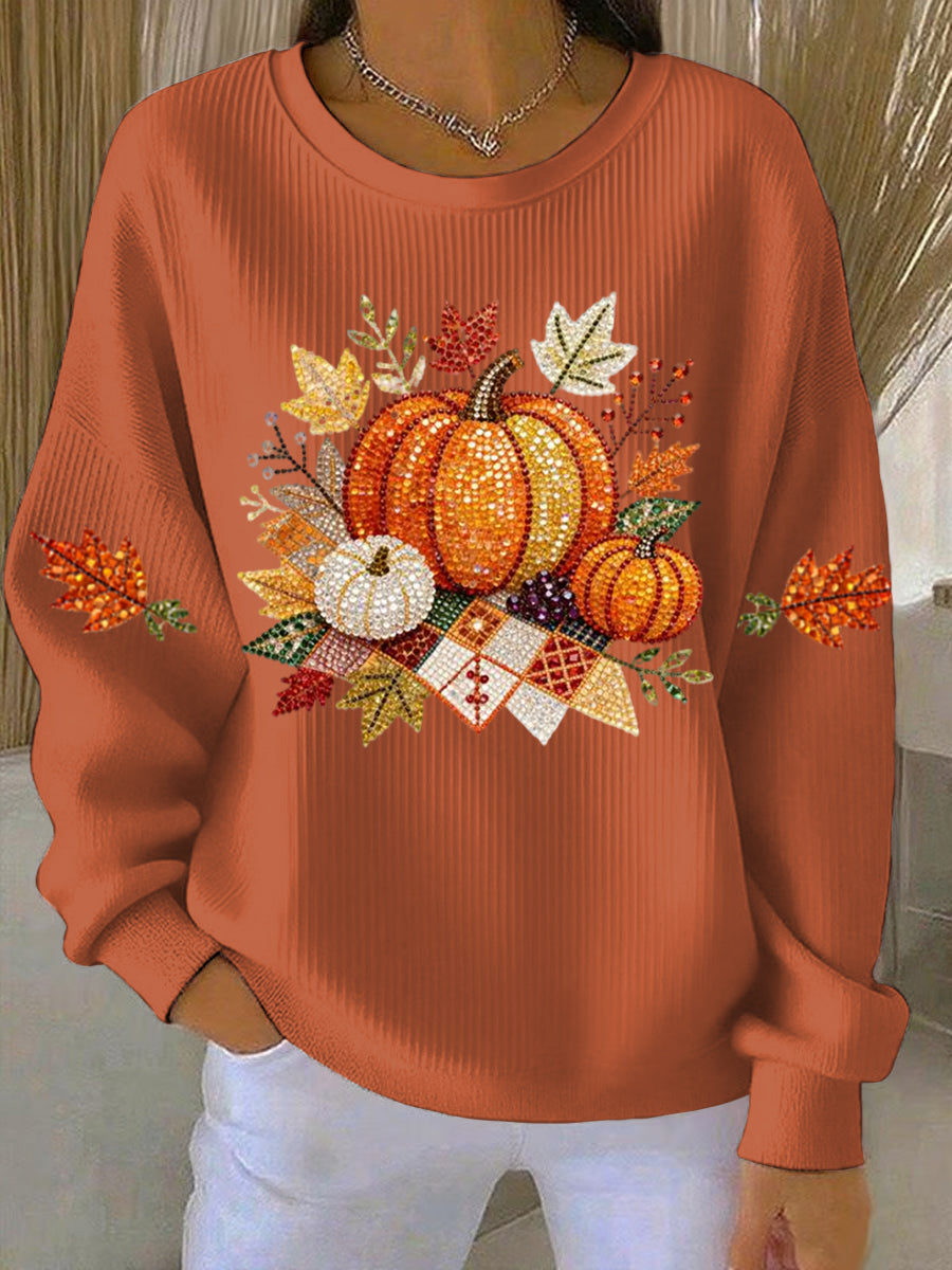 Women's relaxed round-neck sweatshirt with central pumpkin graphic, long sleeves and ribbed cuffs