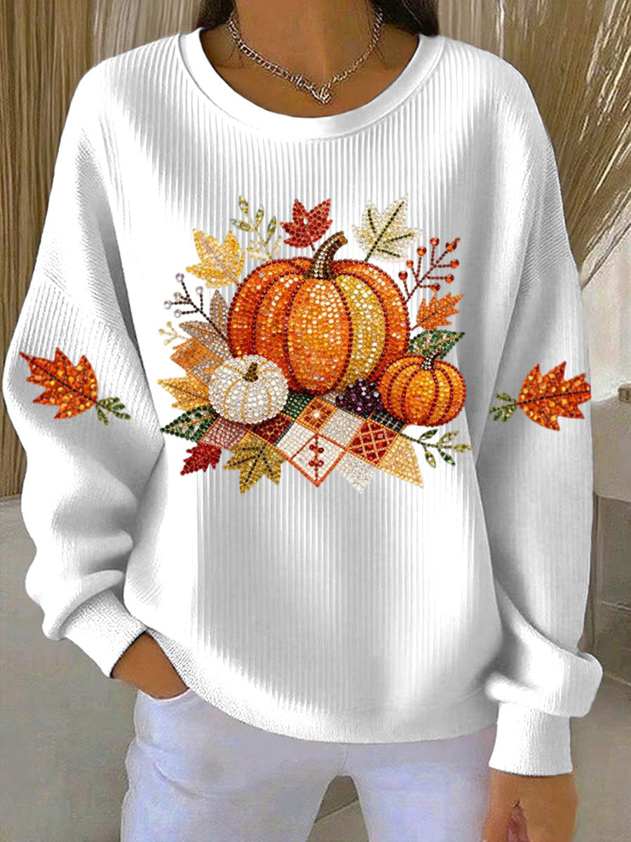 Women's relaxed round-neck sweatshirt with central pumpkin graphic, long sleeves and ribbed cuffs