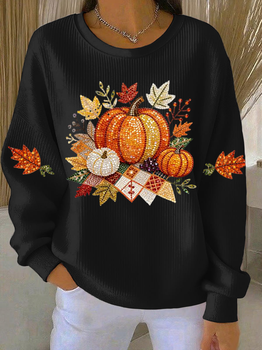 Women's relaxed round-neck sweatshirt with central pumpkin graphic, long sleeves and ribbed cuffs