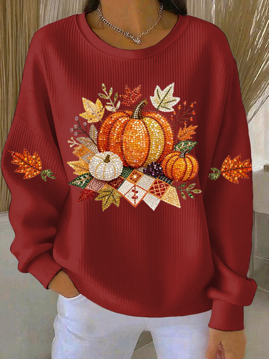 Women's relaxed round-neck sweatshirt with central pumpkin graphic, long sleeves and ribbed cuffs