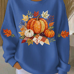 Women's relaxed round-neck sweatshirt with central pumpkin graphic, long sleeves and ribbed cuffs