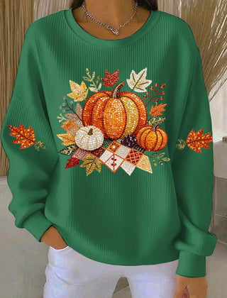 Women's relaxed round-neck sweatshirt with central pumpkin graphic, long sleeves and ribbed cuffs