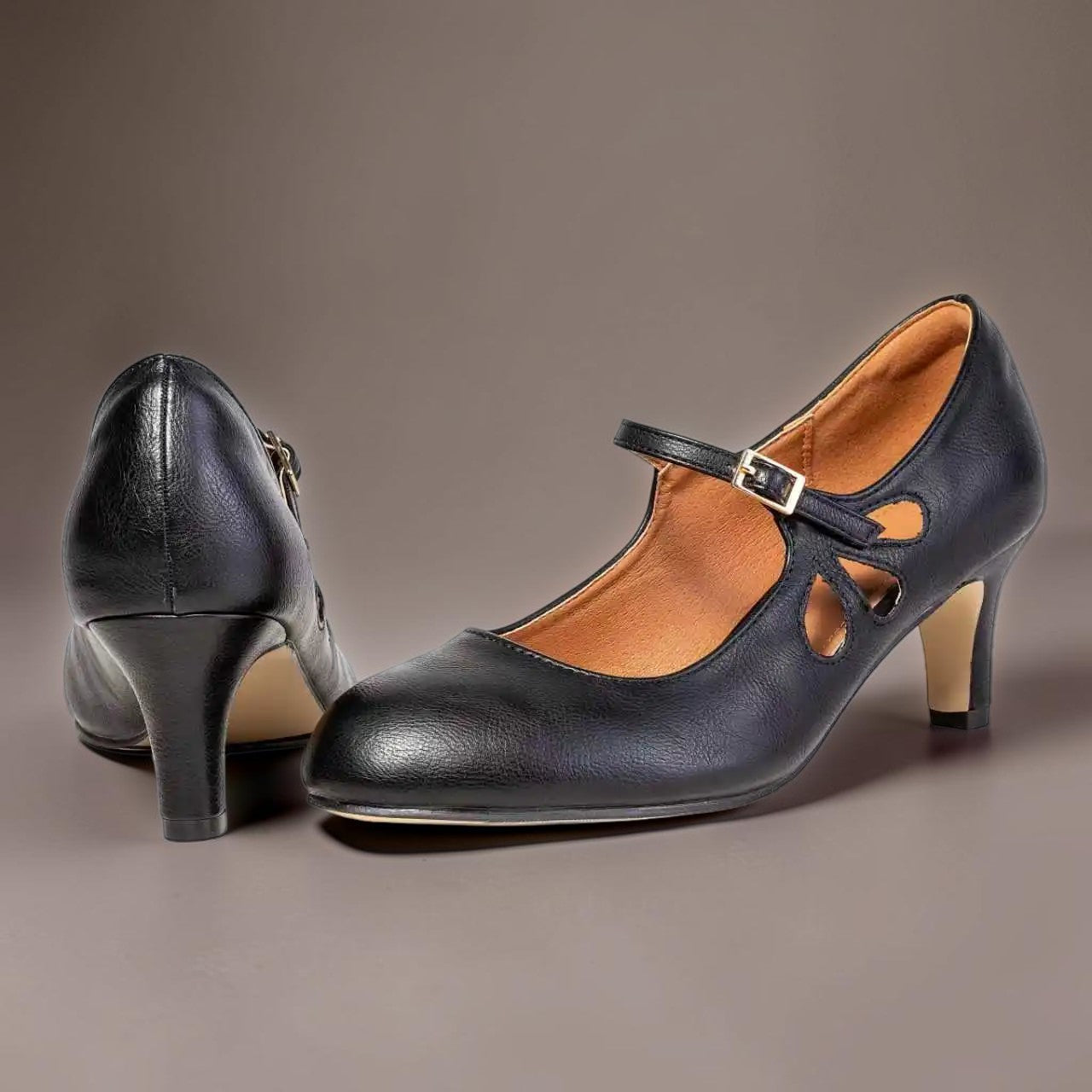 Classic black closed-toe office pumps on a manageable heel