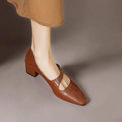 Chiseled square-toe leather Mary Jane pump with gold bit accent and low block heel