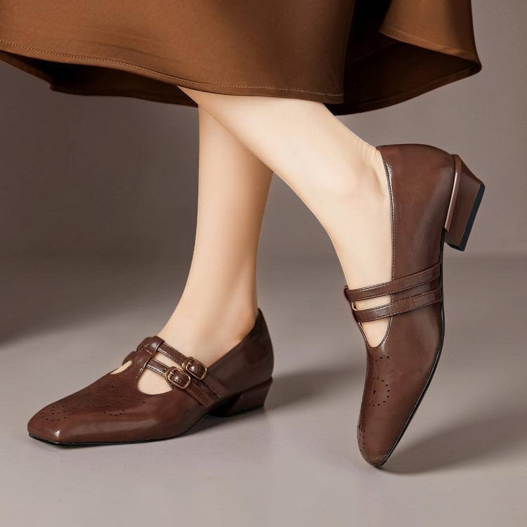 Brogued leather Mary Jane pump with dual buckled straps and a low block heel