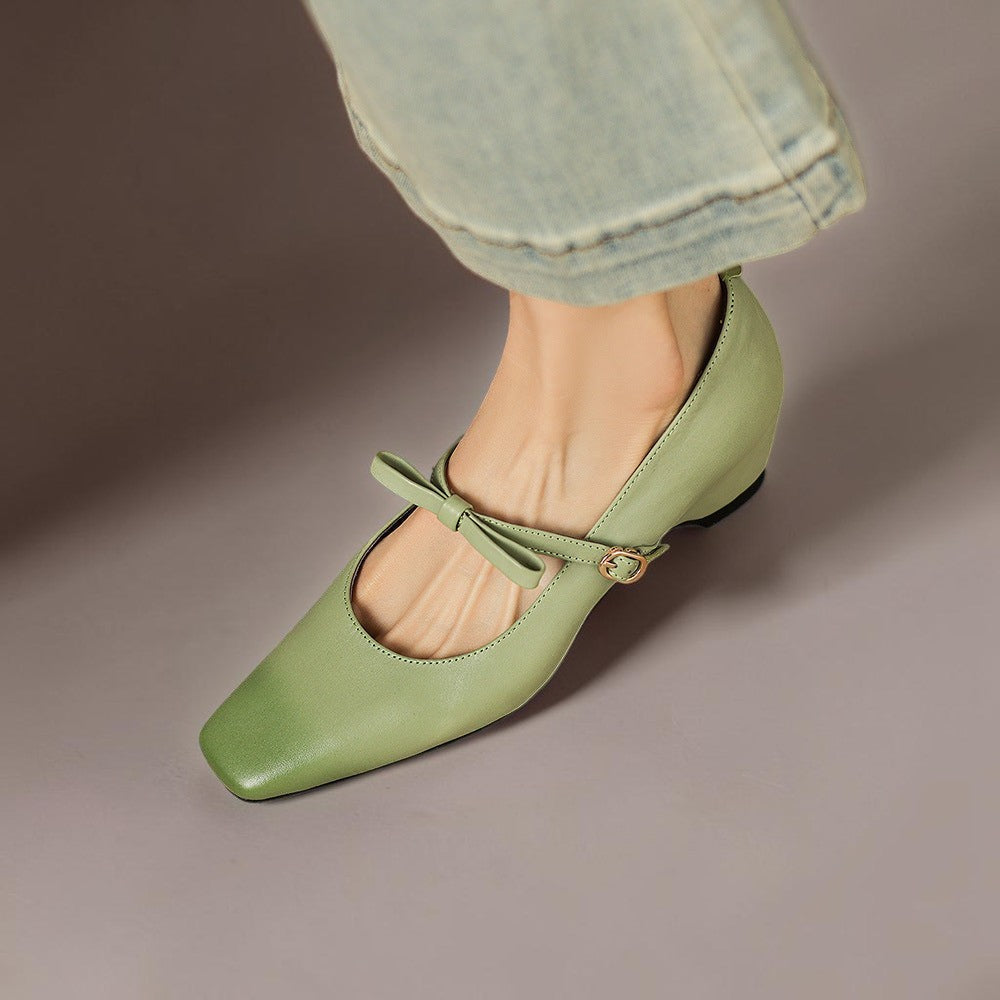 Bow-strap Mary Jane pump with concealed block heel and burnished leather, shown in green, pink and black