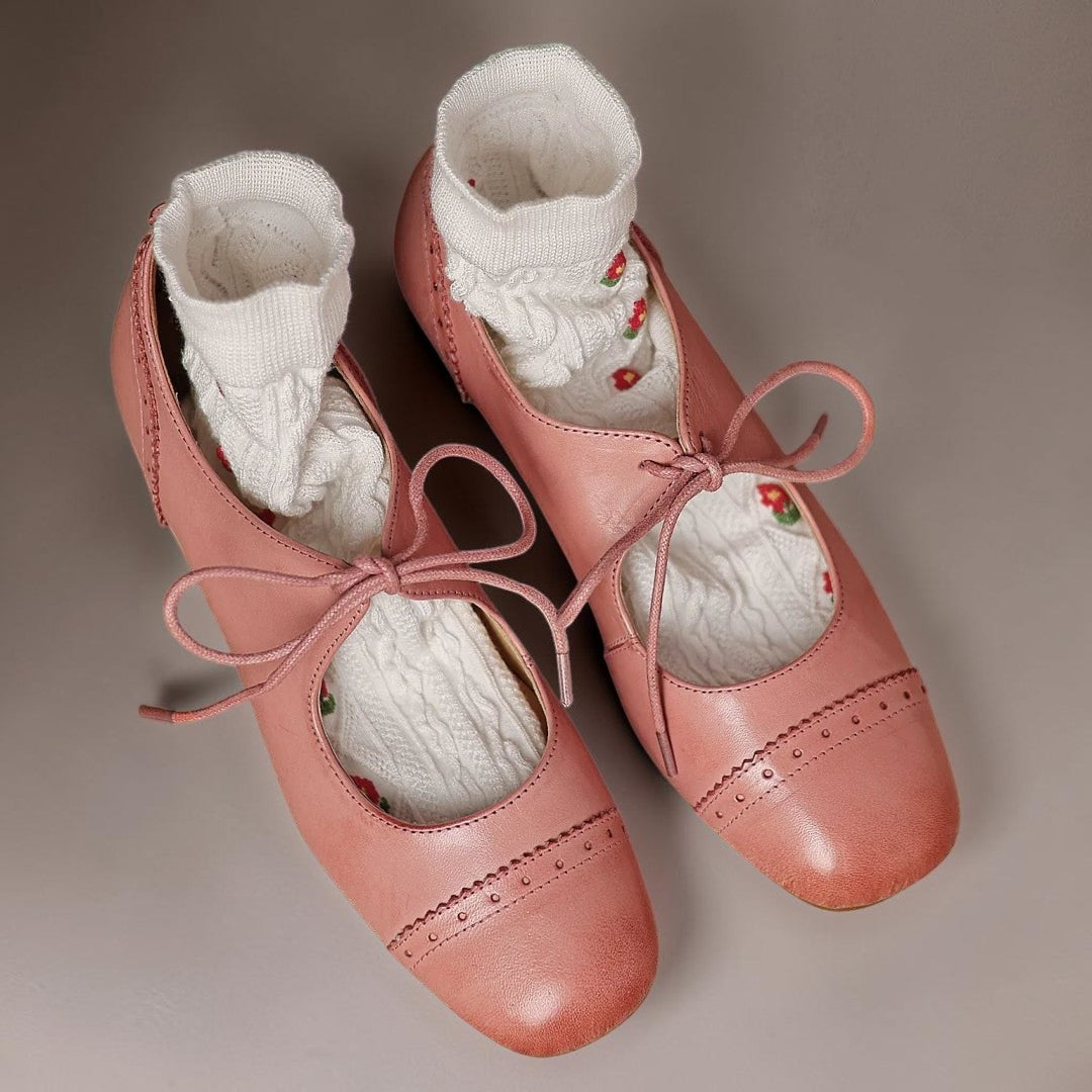Constance carved leather lace-up Oxfords with a low block heel