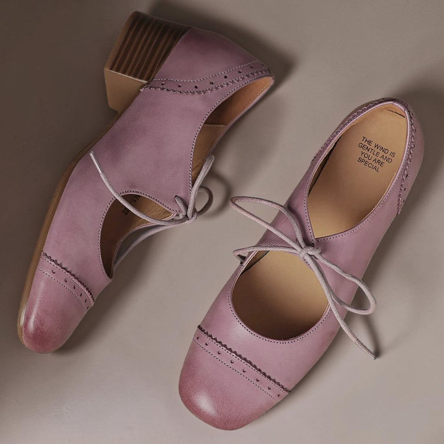 Constance carved leather lace-up Oxfords with a low block heel