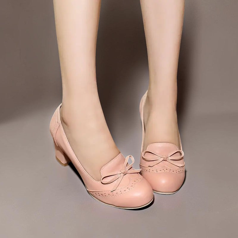 Adelaide closed-toe bow slip-on pumps on a low heel, shown in beige, pink and blue