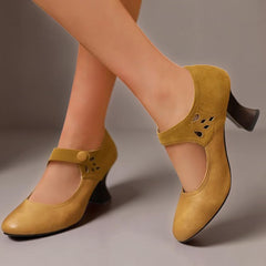 Suede round-toe heels with a secure ankle strap and stable block heel