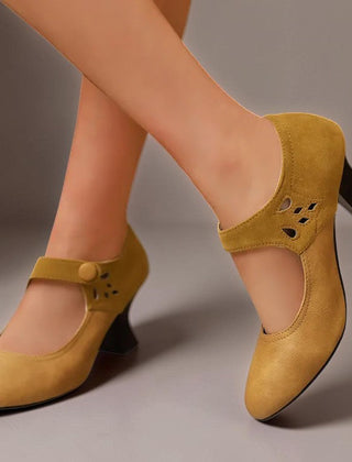 Suede round-toe heels with a secure ankle strap and stable block heel
