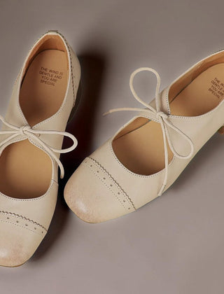 Constance carved leather lace-up Oxfords with a low block heel