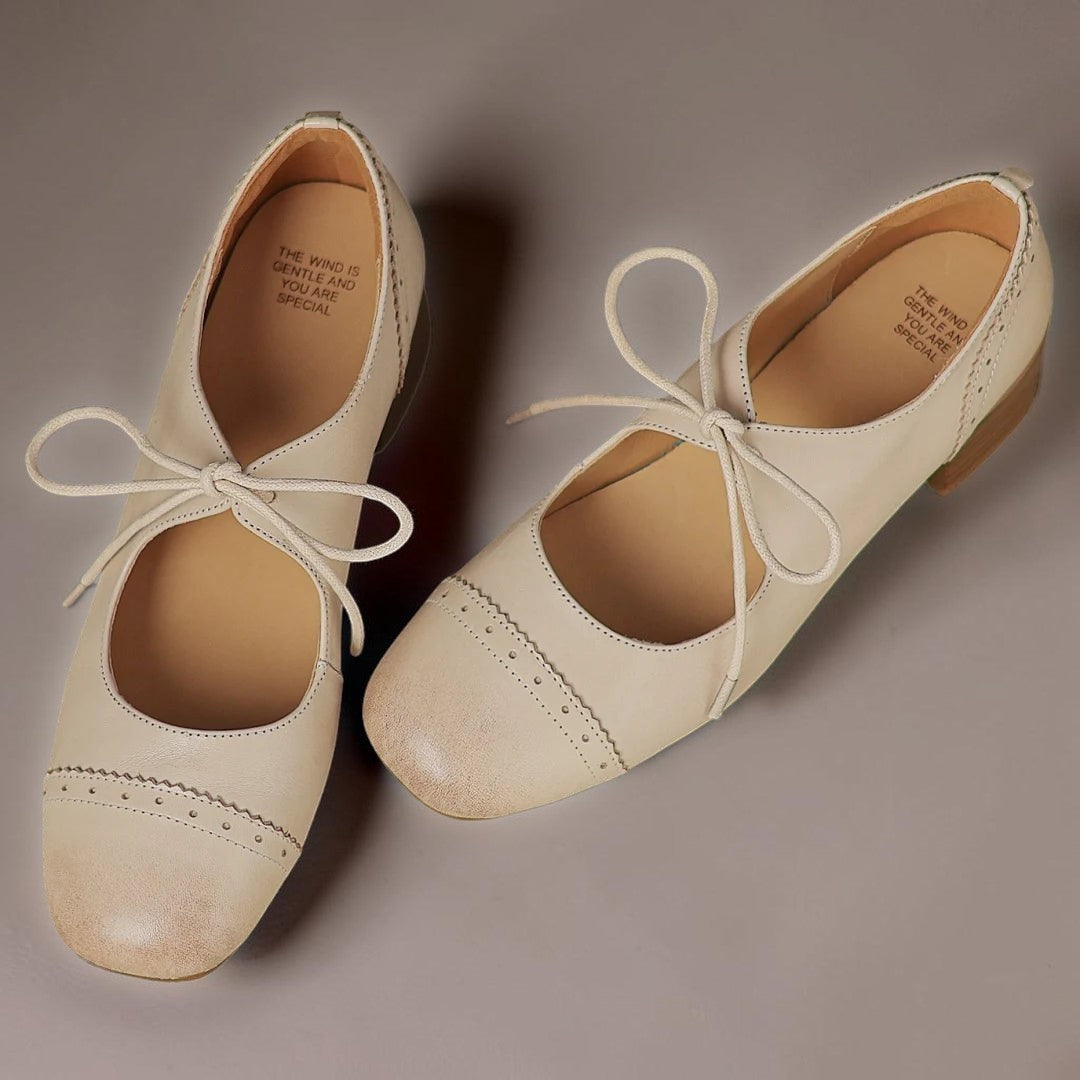 Constance carved leather lace-up Oxfords with a low block heel