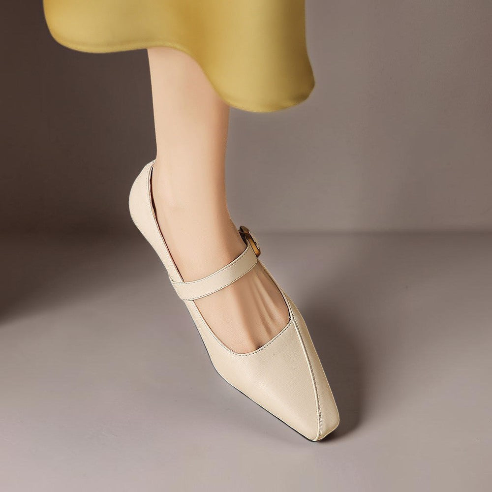 Paneled Mary Jane block heel with gold-tone instep buckle in beige and black