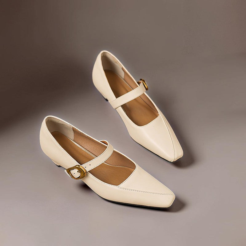 Paneled Mary Jane block heel with gold-tone instep buckle in beige and black