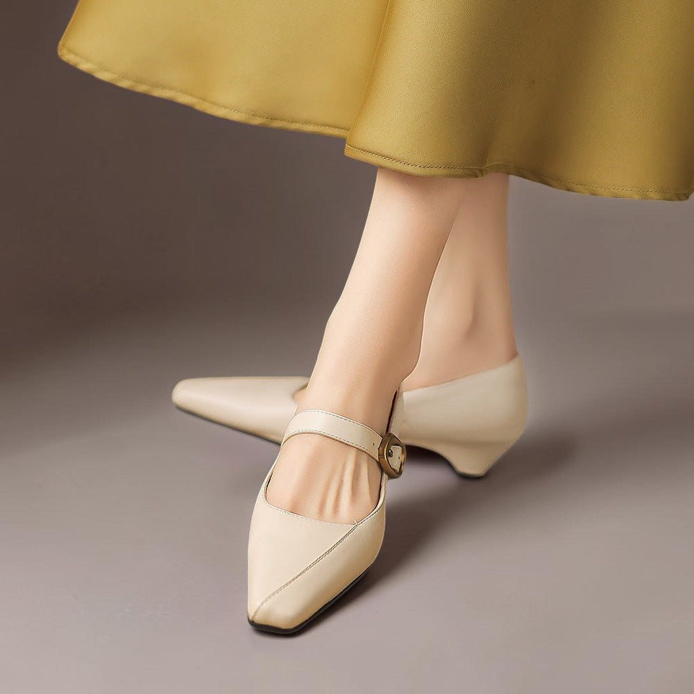Paneled Mary Jane block heel with gold-tone instep buckle in beige and black