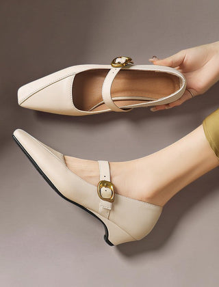 Paneled Mary Jane block heel with gold-tone instep buckle in beige and black