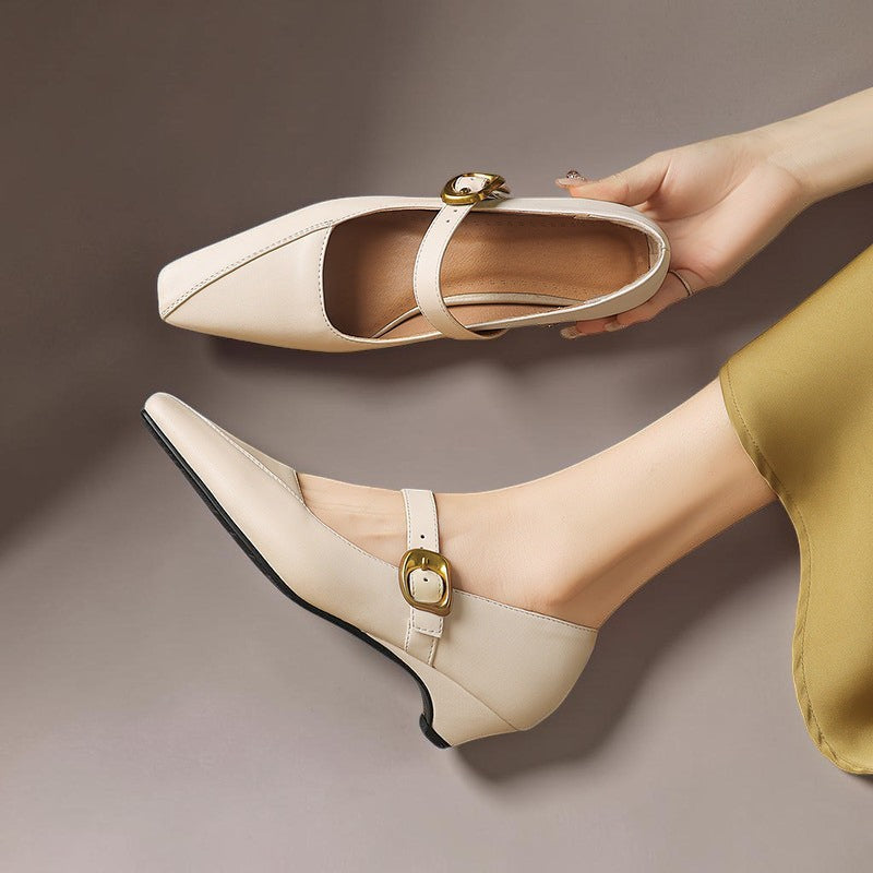 Paneled Mary Jane block heel with gold-tone instep buckle in beige and black