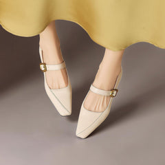 Paneled Mary Jane block heel with gold-tone instep buckle in beige and black