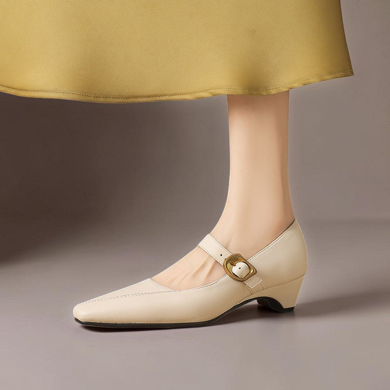 Paneled Mary Jane block heel with gold-tone instep buckle in beige and black