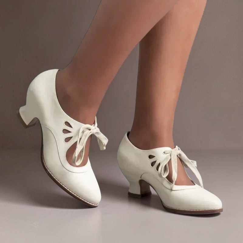 Vintage lace-up Mary Jane pumps with adjustable instep strap and rounded toe