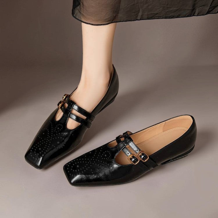 Brogued leather Mary Jane pump with dual buckled straps and a low block heel