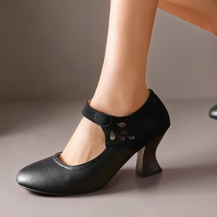 Suede round-toe heels with a secure ankle strap and stable block heel