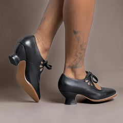 Vintage lace-up Mary Jane pumps with adjustable instep strap and rounded toe