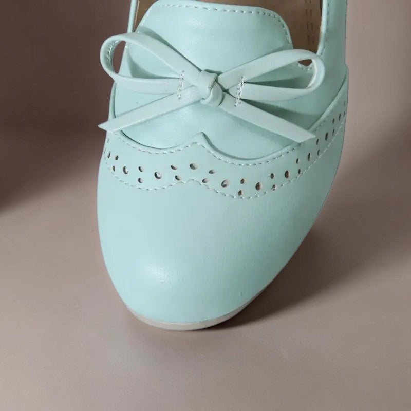Adelaide closed-toe bow slip-on pumps on a low heel, shown in beige, pink and blue