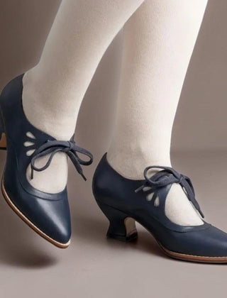 Vintage lace-up Mary Jane pumps with adjustable instep strap and rounded toe