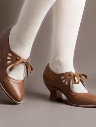 Vintage lace-up Mary Jane pumps with adjustable instep strap and rounded toe
