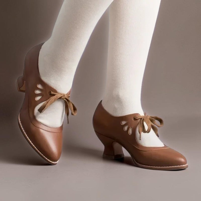 Vintage lace-up Mary Jane pumps with adjustable instep strap and rounded toe