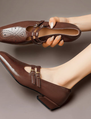 Brogued leather Mary Jane pump with dual buckled straps and a low block heel