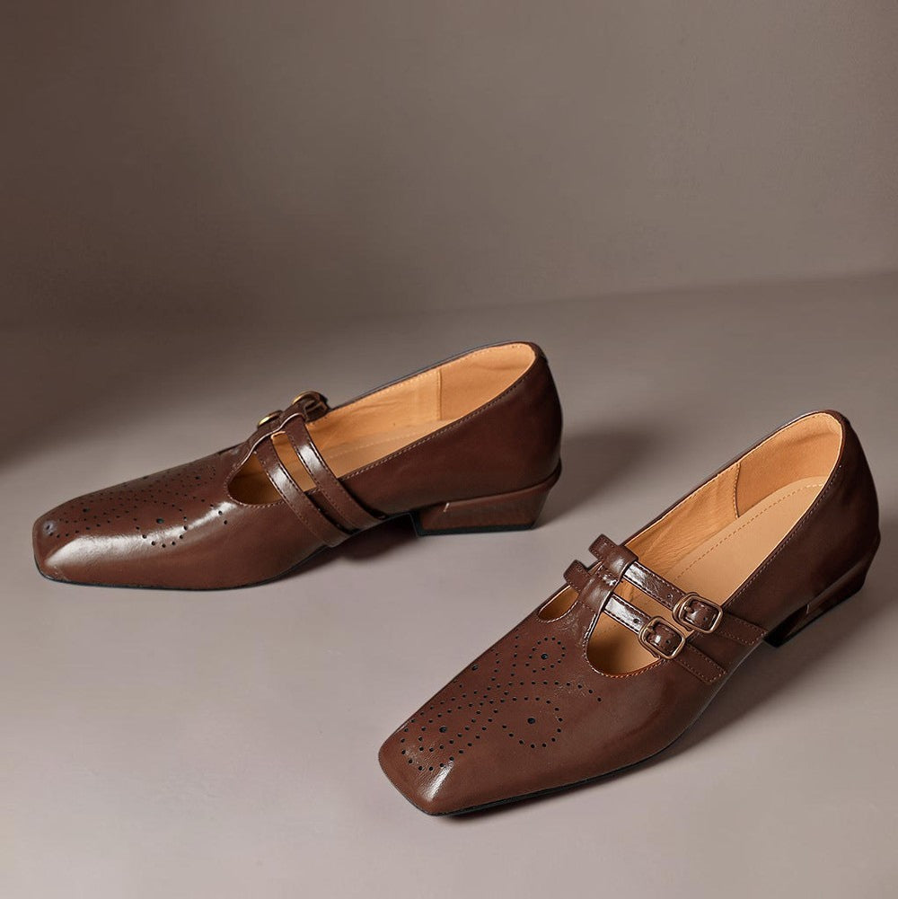 Brogued leather Mary Jane pump with dual buckled straps and a low block heel