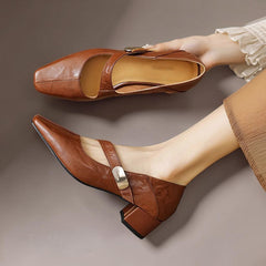 Chiseled square-toe leather Mary Jane pump with gold bit accent and low block heel