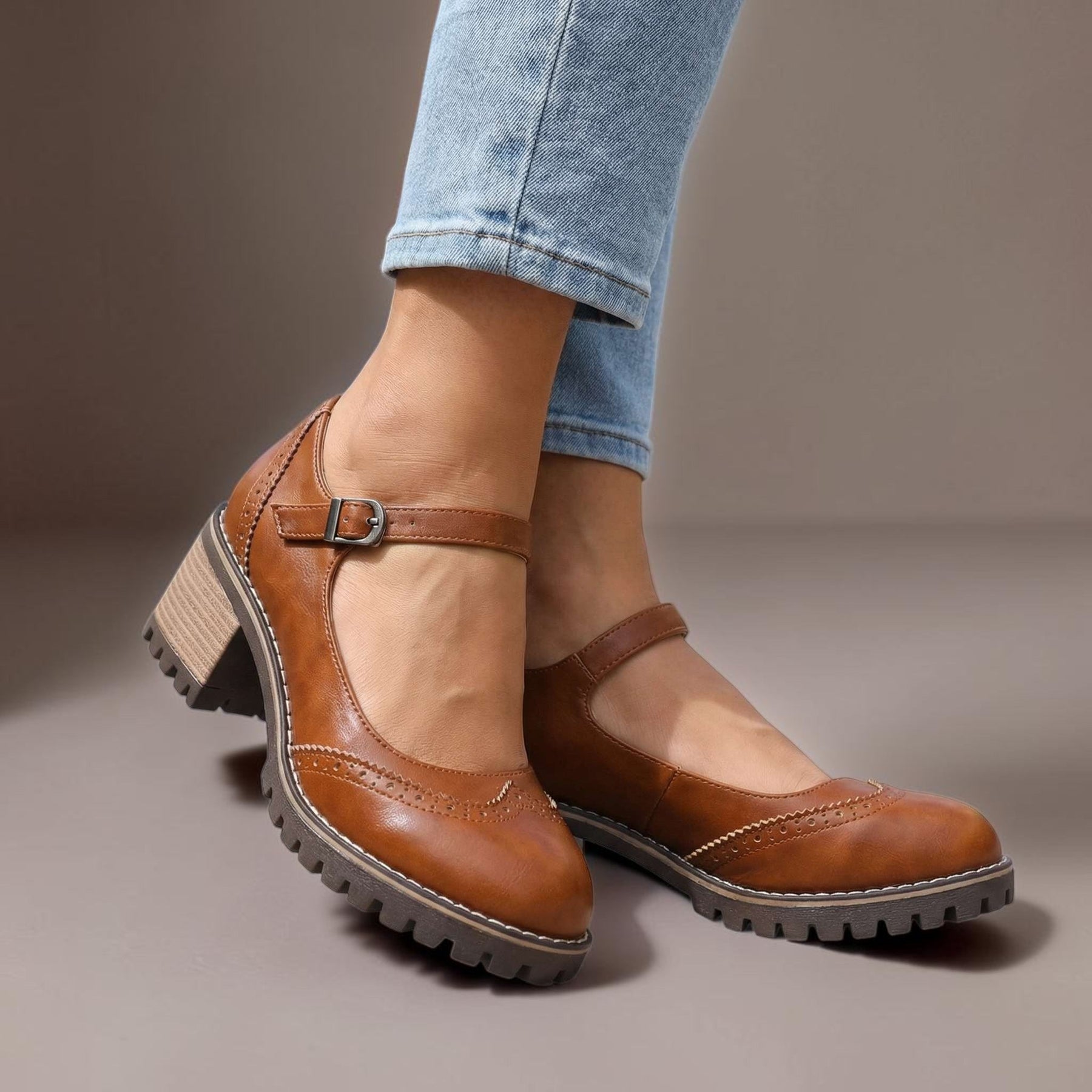 Marie T-strap Mary Jane heels with buckle closure, shown in black, brown and khaki