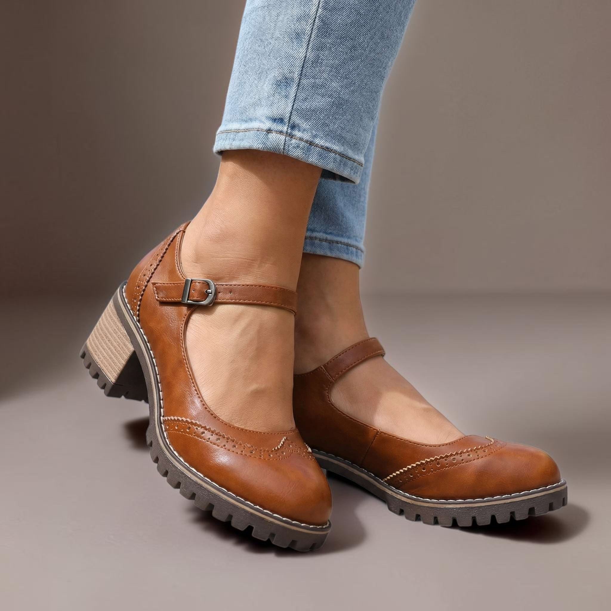 Marie T-strap Mary Jane heels with buckle closure, shown in black, brown and khaki