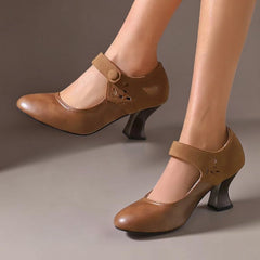 Suede round-toe heels with a secure ankle strap and stable block heel
