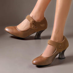 Suede round-toe heels with a secure ankle strap and stable block heel