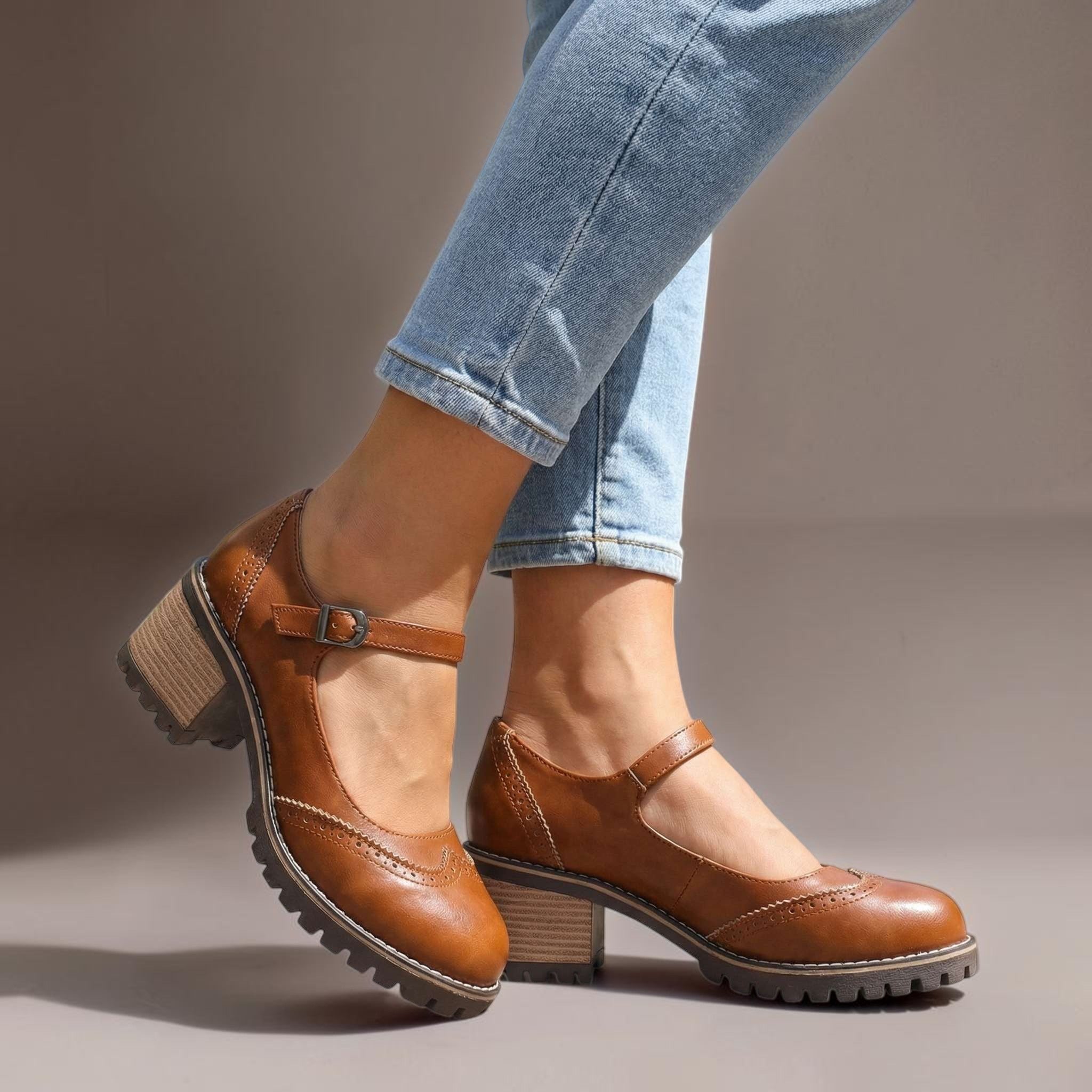 Marie T-strap Mary Jane heels with buckle closure, shown in black, brown and khaki