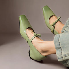 Bow-strap Mary Jane pump with concealed block heel and burnished leather, shown in green, pink and black