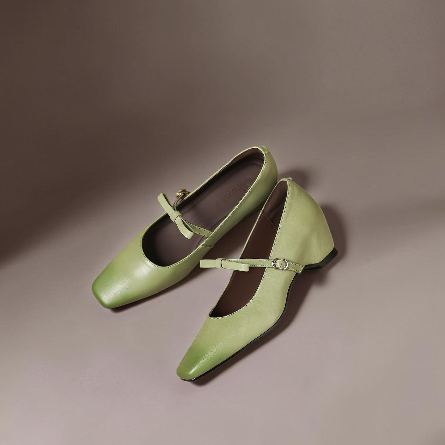Bow-strap Mary Jane pump with concealed block heel and burnished leather, shown in green, pink and black