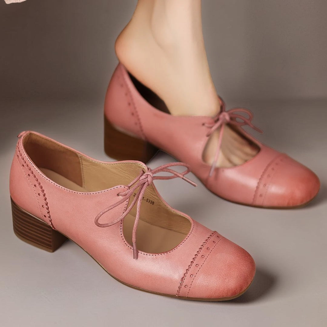 Constance carved leather lace-up Oxfords with a low block heel