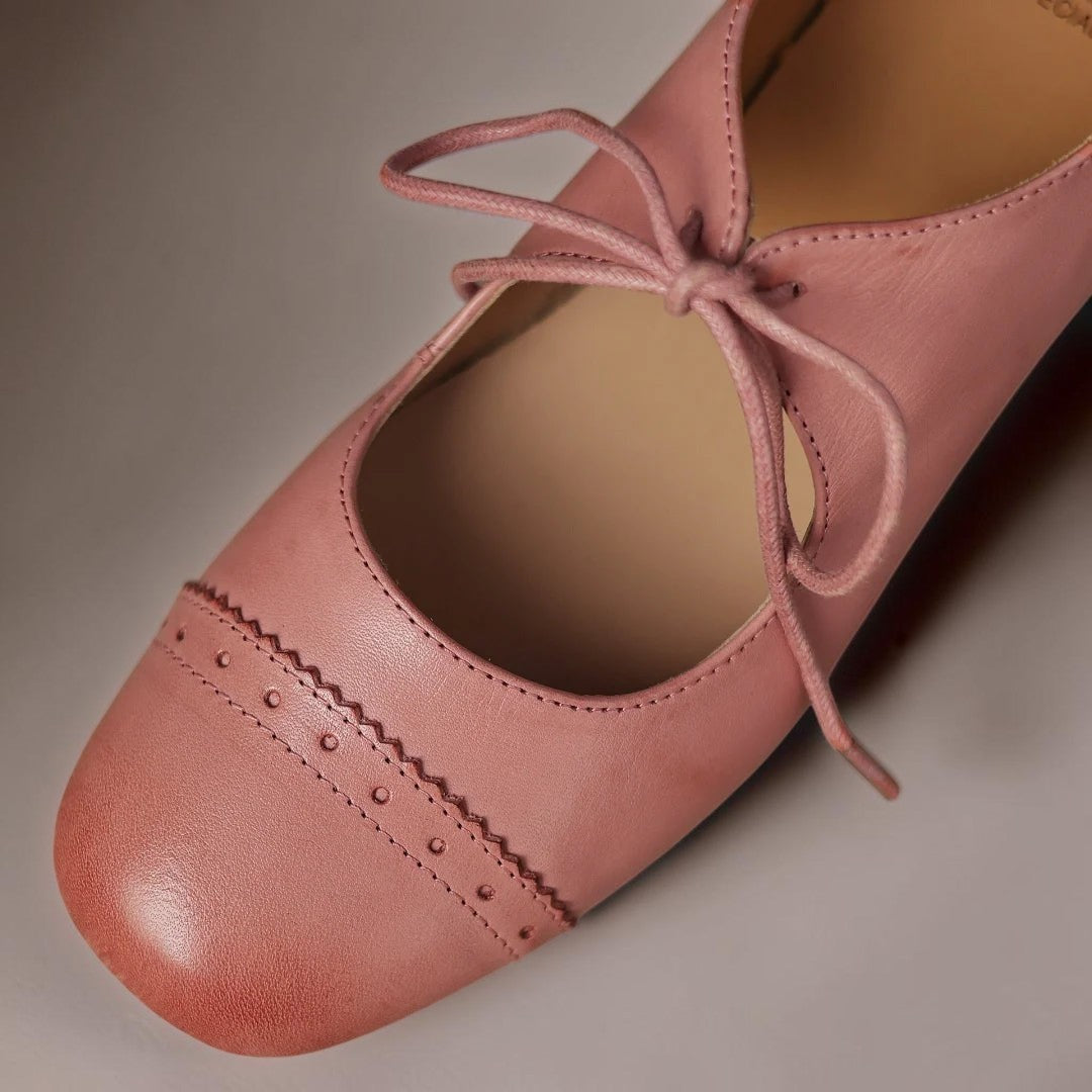 Constance carved leather lace-up Oxfords with a low block heel