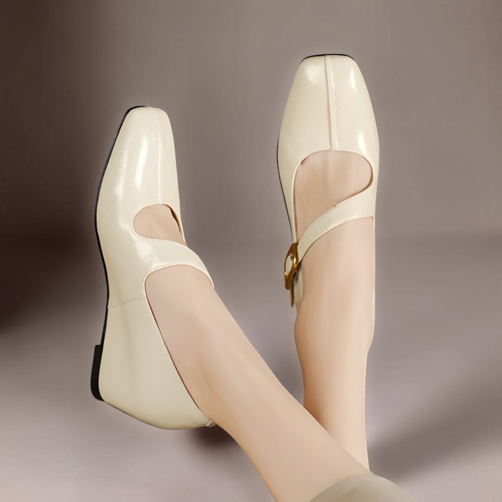 Genuine leather Mary Jane heels with a tilted buckle strap, square toe and concealed wedge sole