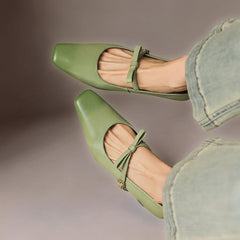 Bow-strap Mary Jane pump with concealed block heel and burnished leather, shown in green, pink and black