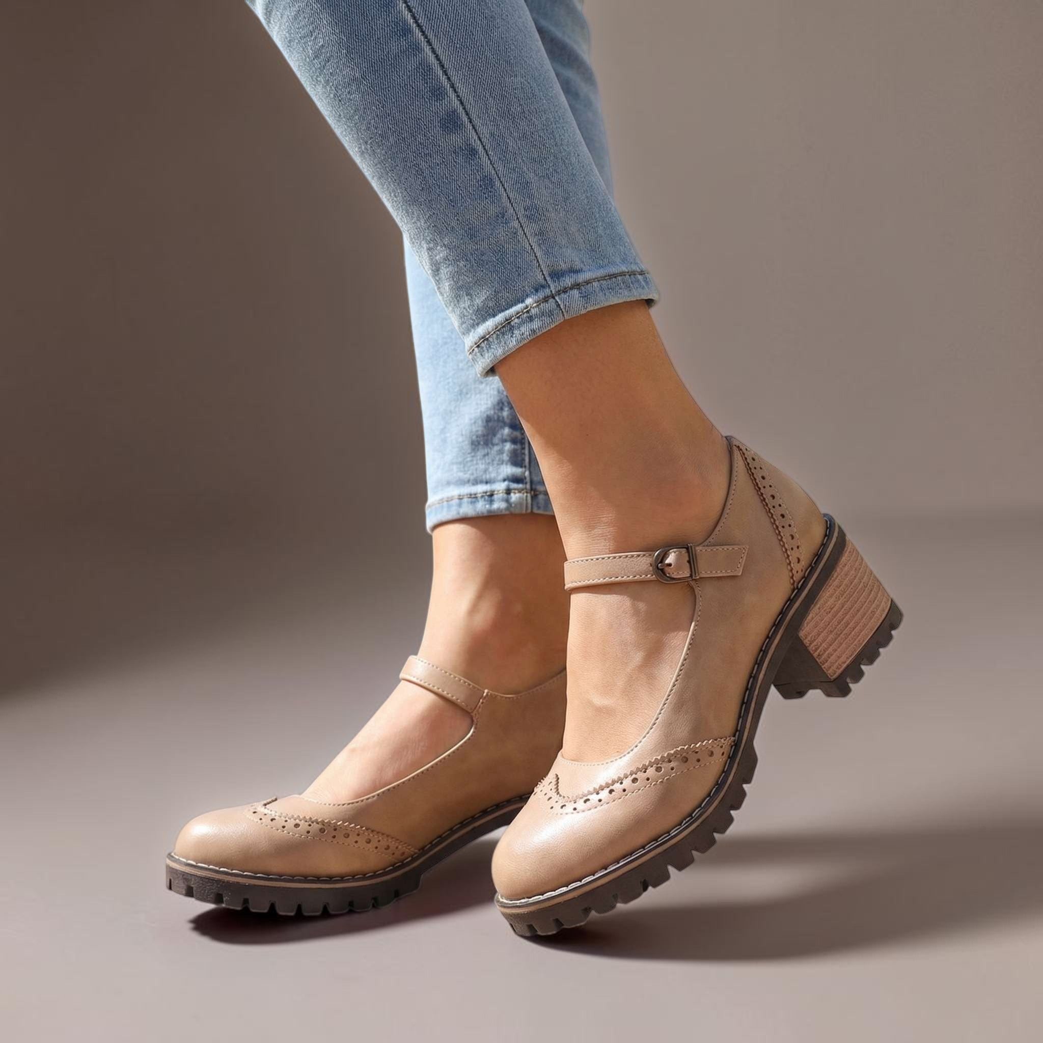 Marie T-strap Mary Jane heels with buckle closure, shown in black, brown and khaki