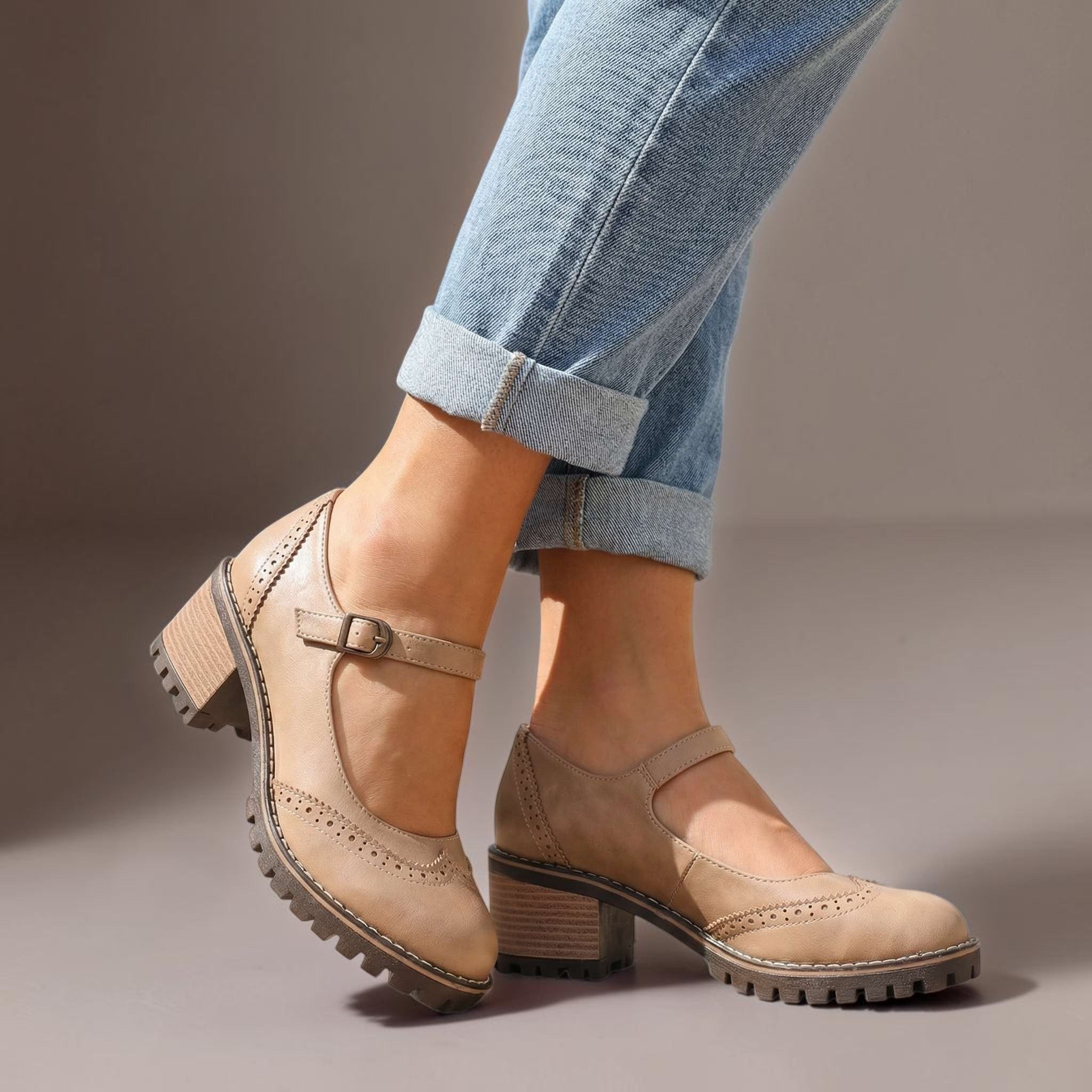 Marie T-strap Mary Jane heels with buckle closure, shown in black, brown and khaki