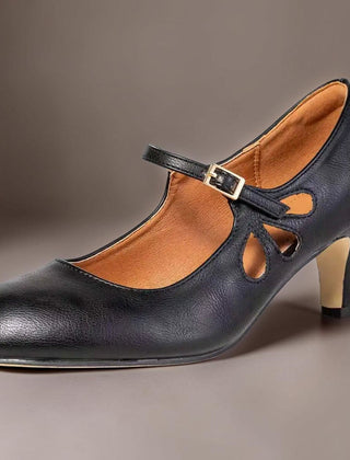Classic black closed-toe office pumps on a manageable heel